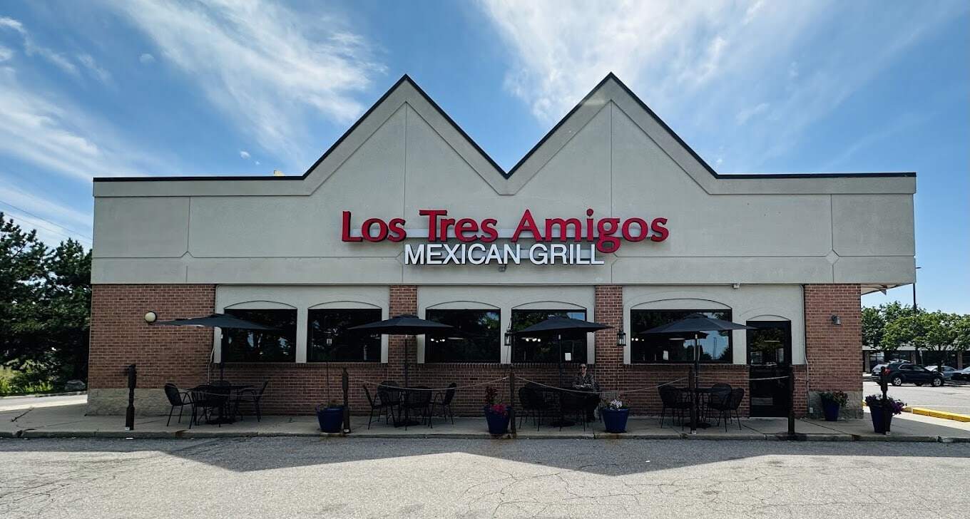 Exterior view of Los Tres Amigos Mexican Grill restaurant with outdoor seating.