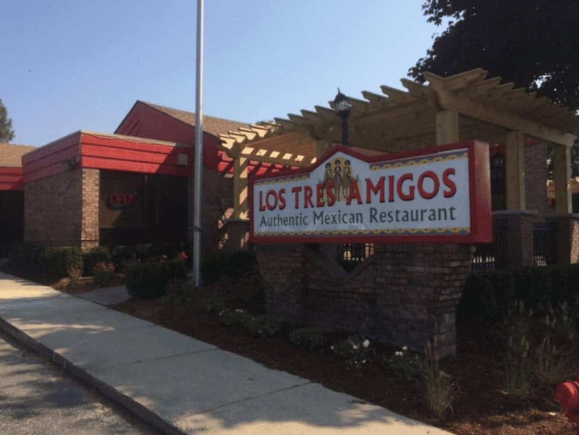 Exterior view of Los Tres Amigos authentic Mexican restaurant sign.