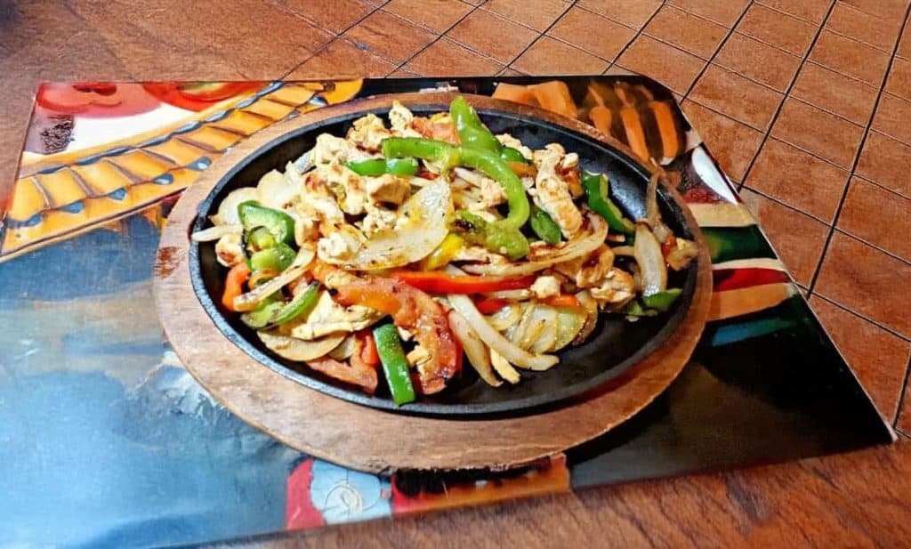 Chicken fajitas are a delicious and very popular dish for Winter Mexican Dining in Canton MI a Los Tres Amigos.