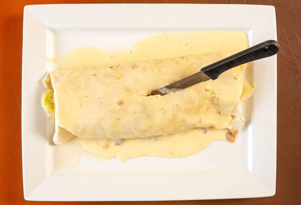 Smothered in rich cheese sauce and made to satisfy, this burrito is a winter favorite for families dining in Plymouth. Hearty, flavorful, and perfect for relaxed winter Mexican family dining in Plymouth MI.