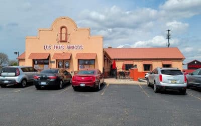 Historic Mexican Restaurant facade with parking lot.