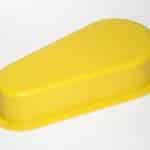 Yellow safety cover for machinery protection and safety enhancement.