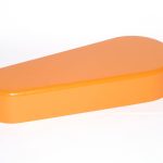 Orange machine guard cover for industrial safety and equipment protection.