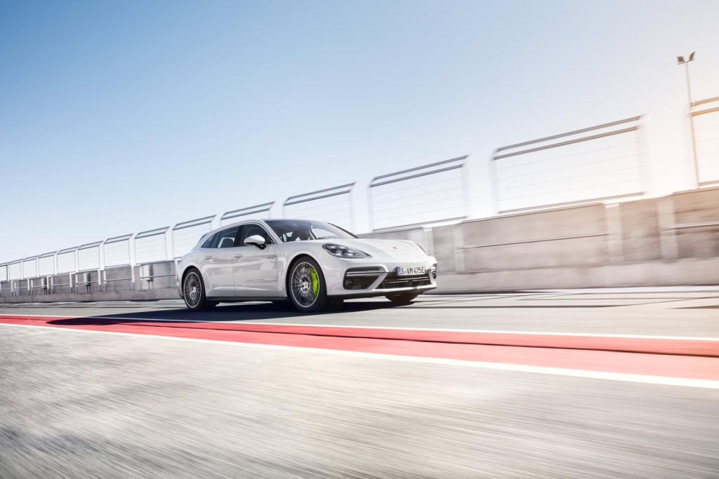 Porsche Panamera E-Hybrid and Composer Jimek on a racetrack