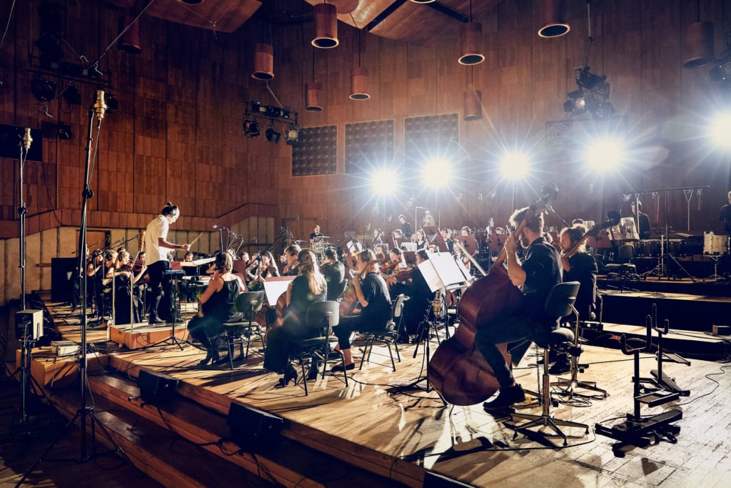 Composer and Musician Jimek with his orchestra