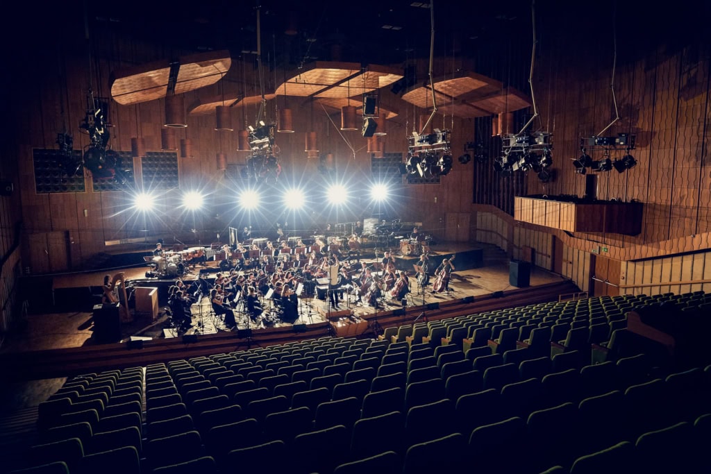 Composer and Musician Jimek with his orchestra