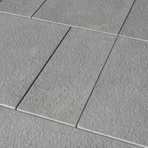 Close-up of gray textured tile flooring for modern interior design.