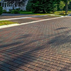 Brick driveway surface with clean, organized paving for home improvement.