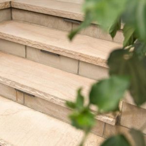 Outdoor brick staircase with modern design and clean lines. Perfect for enhancing curb appeal and ou.