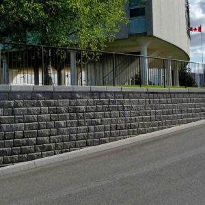 Fence and retaining wall at a modern building.