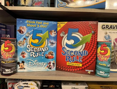 Two 5 Second Rule game boxes on store shelf with Disney theme and red design.
