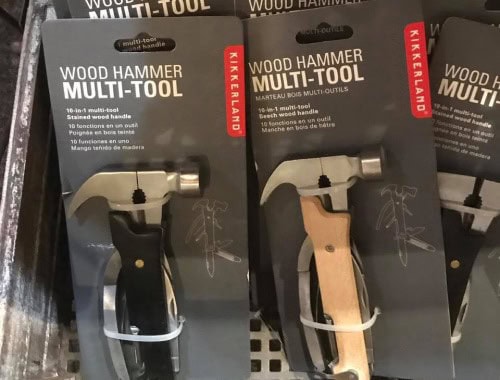 Kikkerland wood hammer multi-tool in packaging, versatile for various tasks.