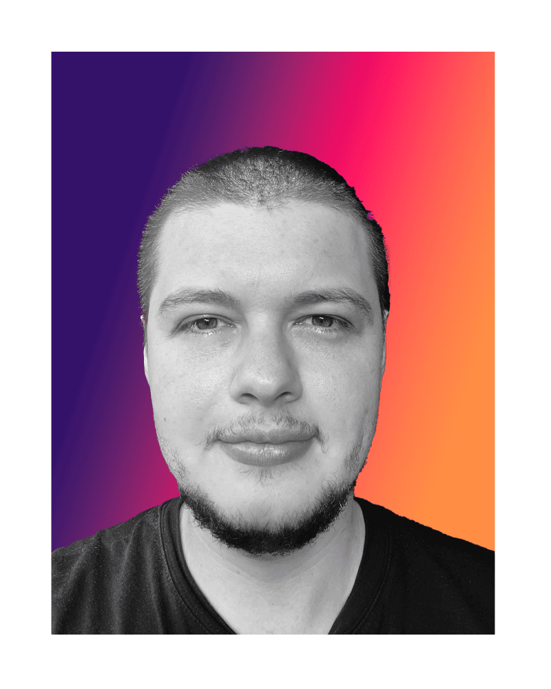 Digital Marketing Agency A portrait by Paradox Media captures a person with short hair and a beard, facing forward. The background beautifully transitions from a gradient of purple to orange. Paradox Media