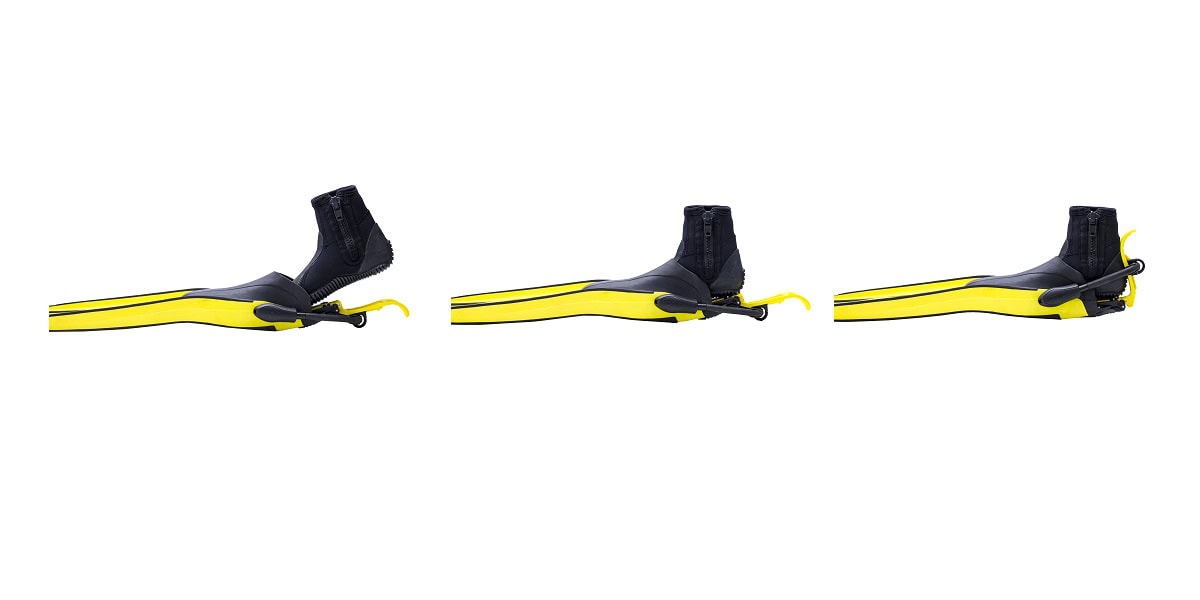 Palmes de plongée jaunes et noires, idéales pour explorer le monde sous-marin.