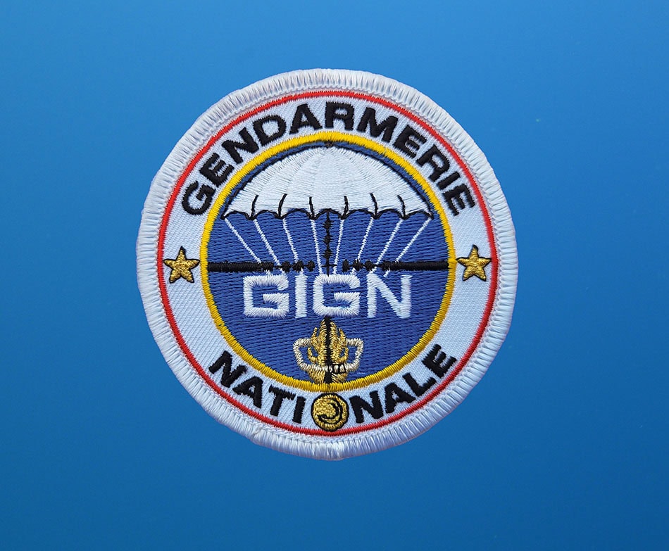 Insigne du GIGN, symbolisant l'expertise en intervention sous-marine et la plongée professionnelle.