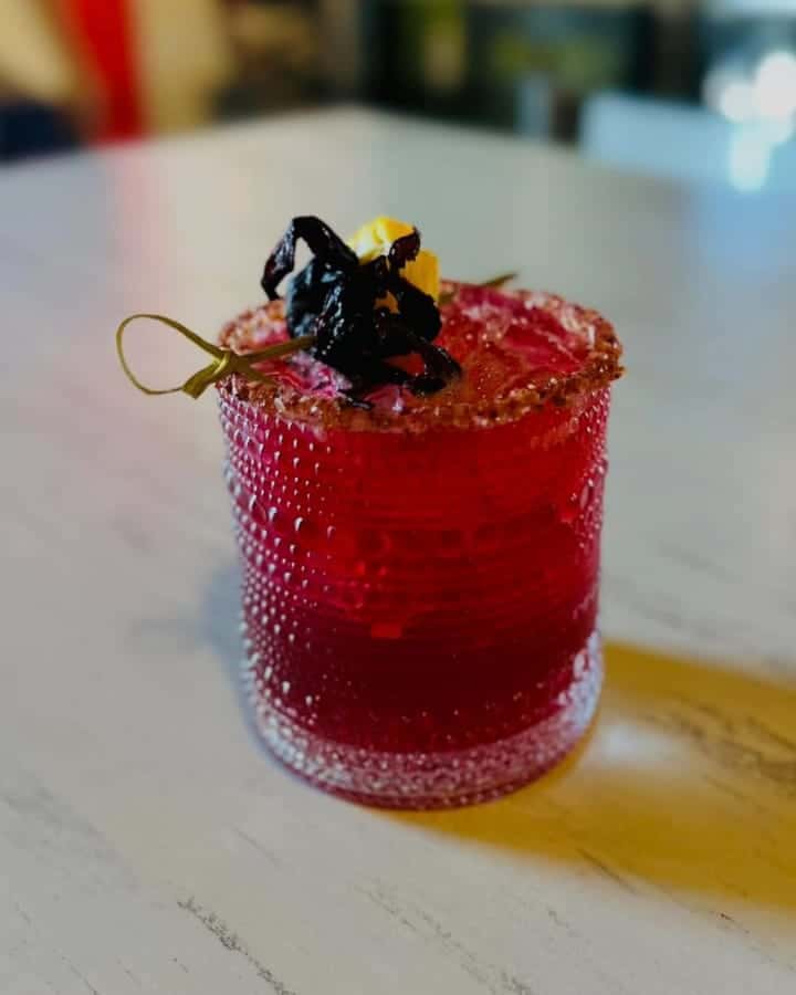 House-made cocktail rimmed with chili salt—Pure Mex's signature tequila drink bursting with bold, Mexican-inspired flavor.