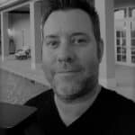 Portrait of John R. at Reality Capture Experts in black and white.