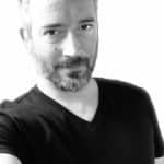 Portrait of Shawn L. from Reality Capture Experts in black and white.