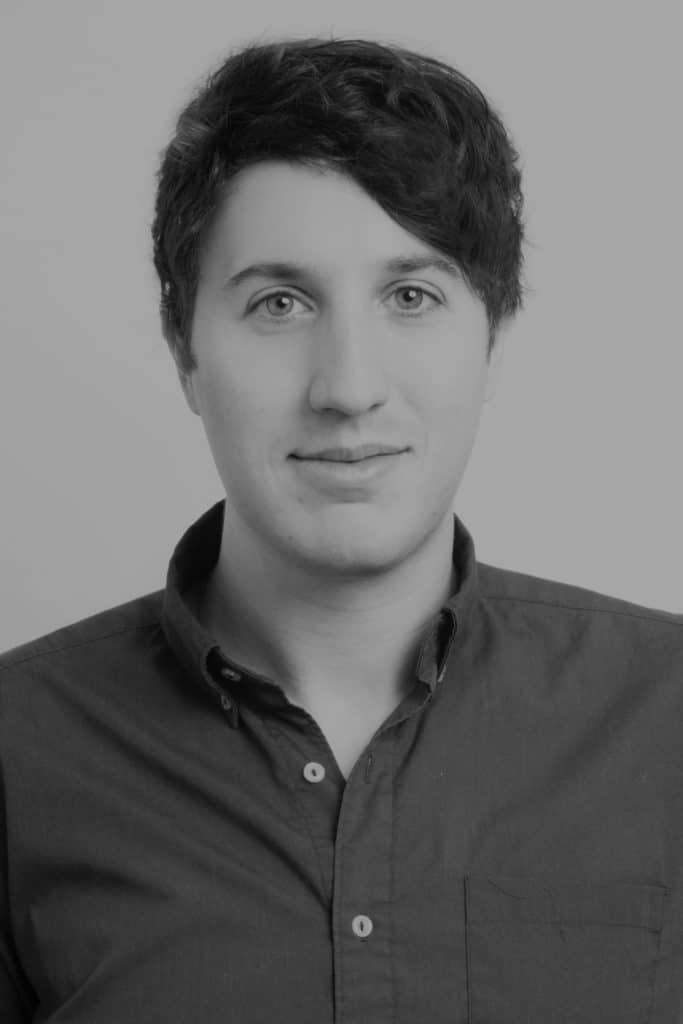 Portrait of Alex S. from Reality Capture Experts in black and white.