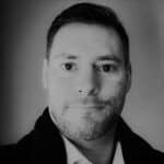 Portrait of Dan O., a reality capture specialist, in black and white.