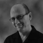 Portrait of Greg W. from Reality Capture Experts in black and white.