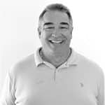Smiling man in polo shirt, professional portrait for Reality Capture Experts.