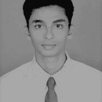 Black and white portrait of Niranjan R. in formal attire.