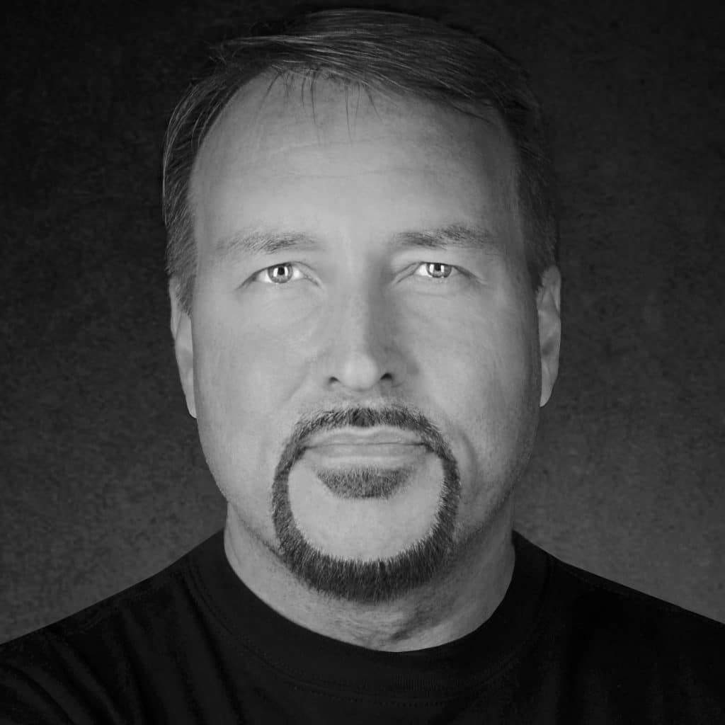 Portrait of Peter S. from Reality Capture Experts in black and white.
