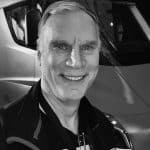 Portrait of Phil G. smiling in front of a vehicle at Reality Capture Experts.