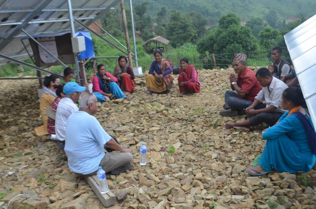 A community training session on how to use and maintain the solar panels. 