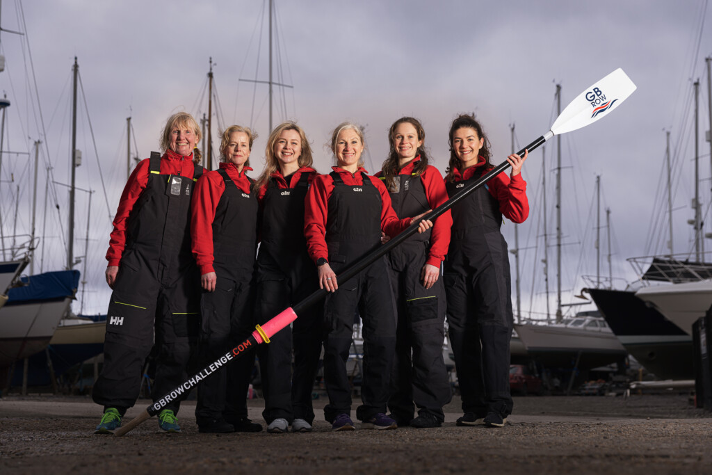 Group of six women with an oar