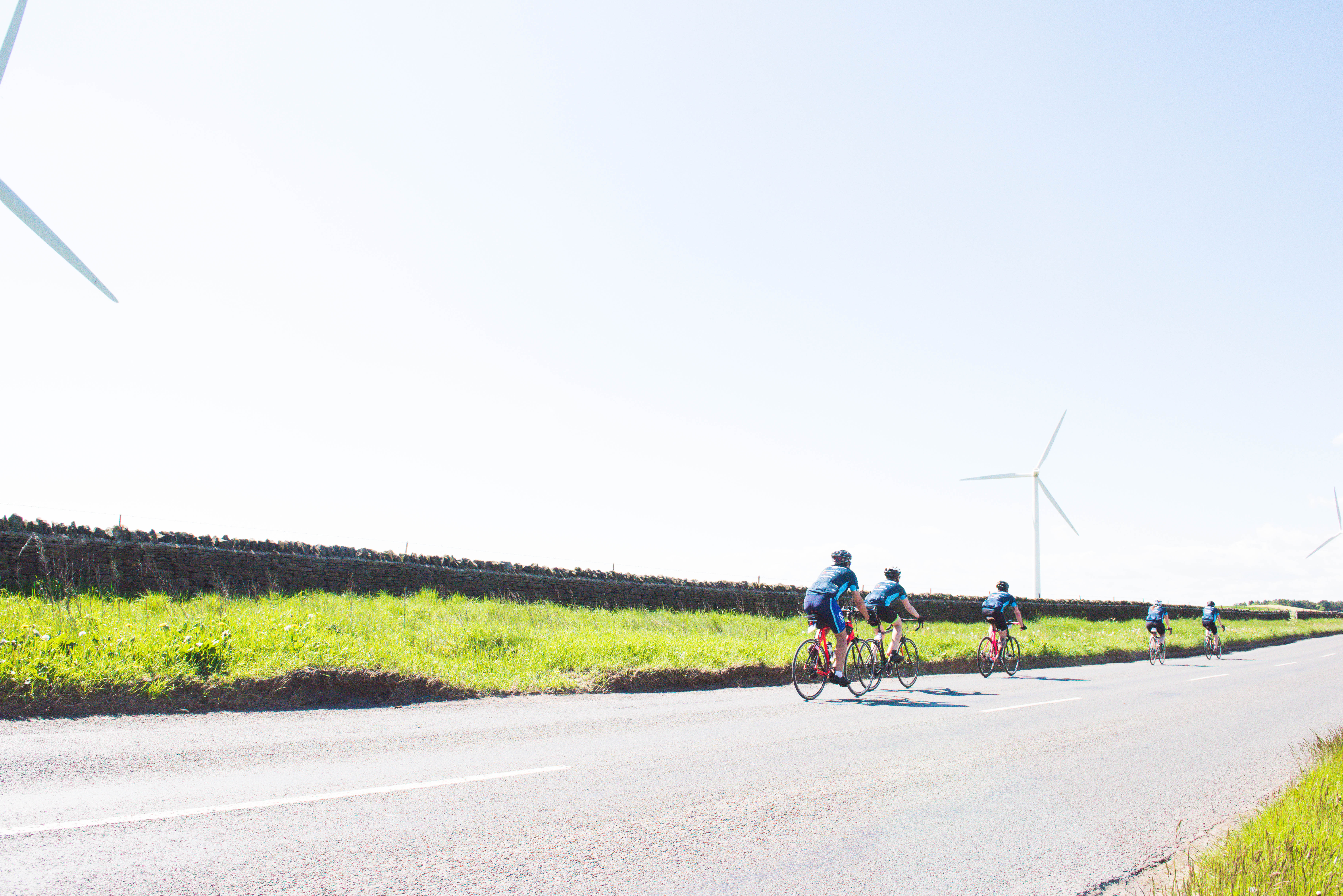 Five Earth Wind & Tyre cyclists