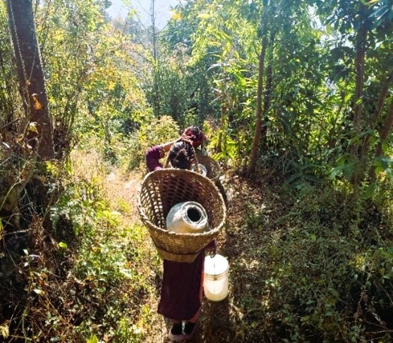 Mina fetching water