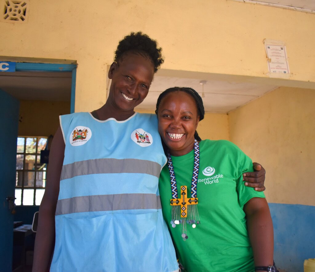 Peris with a community health promoter