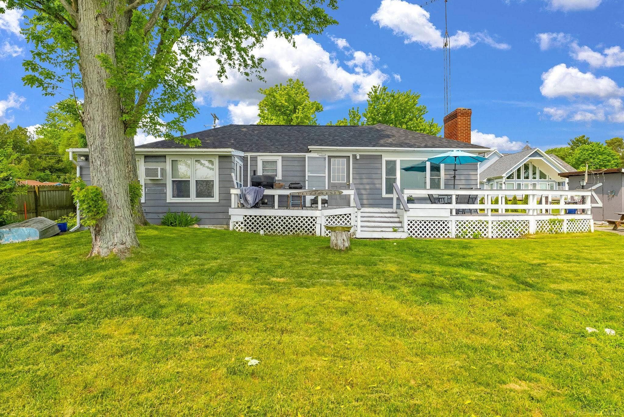 86' Lake Huron Waterfront on the southern border of Sanilac County.  2 bedroom 2 bath 2000sq.ft lake home & 600sq.ft guest home with 2 bedroom 1 bath is just one of unique things about this property.  No bluff to your beautiful beach with just a few steps to your sandy beach.  Wood flooring, knotty pine in the dining room, stone fireplace.  One of kind with endless potential.