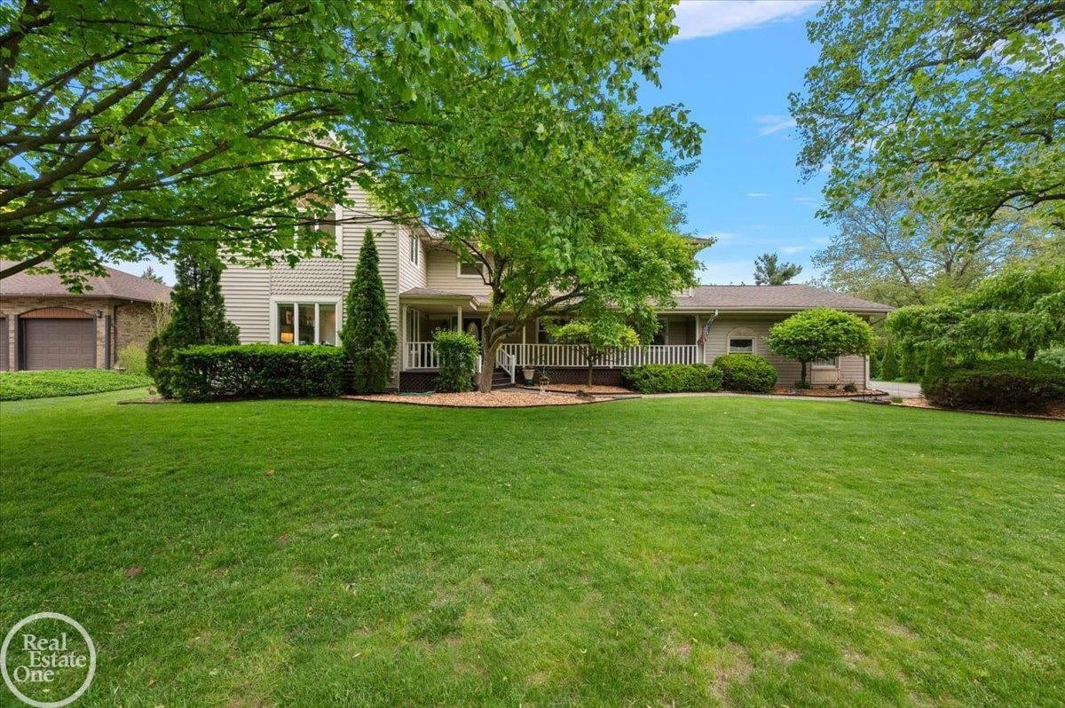 Welcome to this stunning 3,000 square foot home nestled on 1.69 private acres in the highly sought-after Troy School District. Offering five bedrooms and four and a half baths, this home combines space, comfort, and thoughtful updates in an exceptional setting.  The beautifully renovated kitchen opens seamlessly to the main living areas, creating the perfect flow for both everyday living and entertaining. Natural light pours into the home, enhanced by its ideal south-facing orientation, while the inviting four-seasons room provides year-round enjoyment and tranquil views of the property.  Step outside to your own backyard retreat, complete with an in-ground pool and a peaceful, tree-lined setting. A scenic creek runs along the rear of the property, offering privacy and the rare assurance that no future development will ever disrupt the natural surroundings.  This is a unique opportunity to own a spacious, updated home with acreage, privacy, and a prime location—truly the best of both worlds.