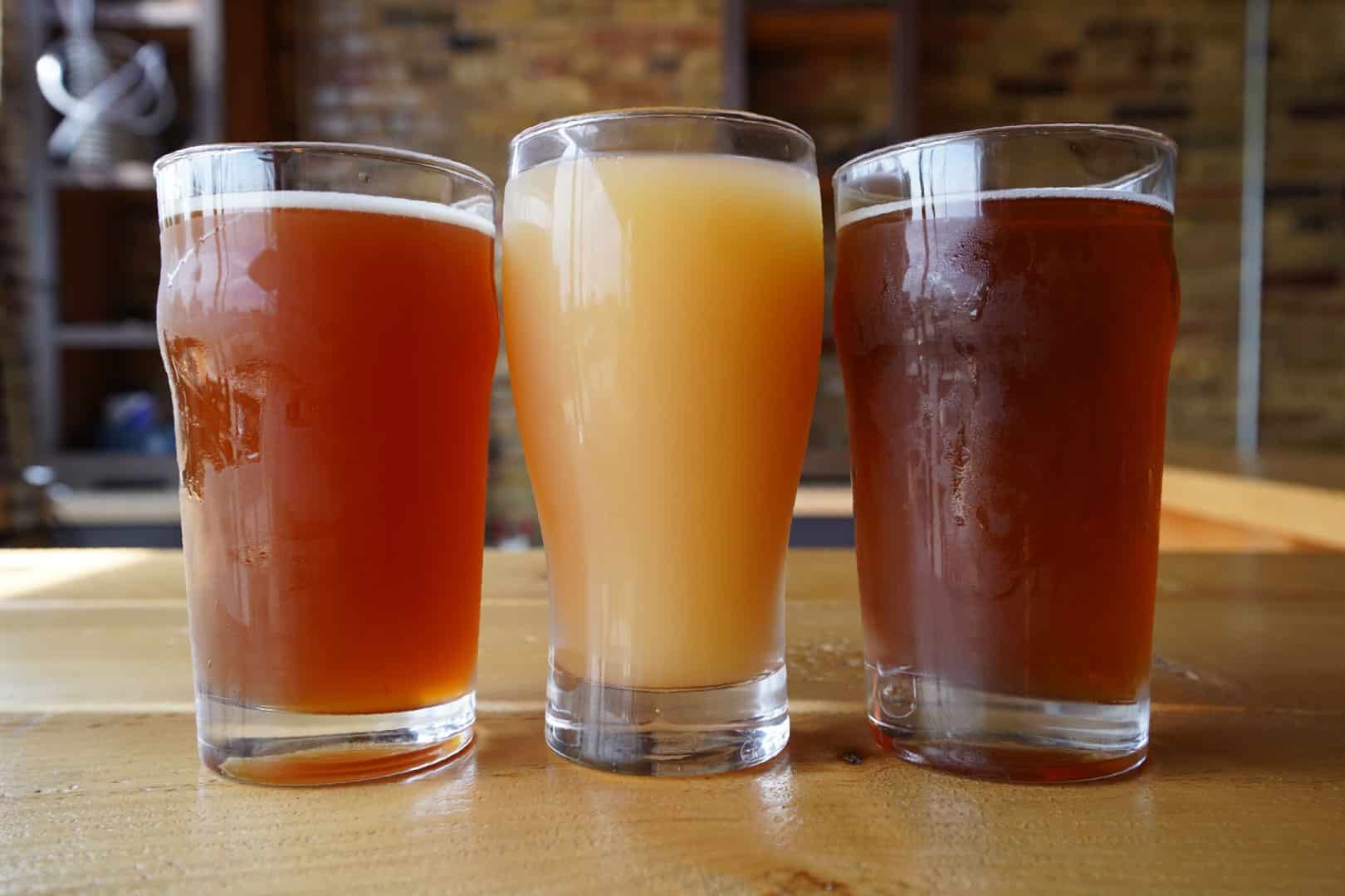 three beer glasses