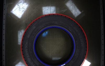 Tire on conveyor belt 