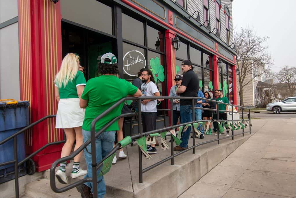 People lining up outside Shamrock on Stocking for St. Patrick's Day celebration.