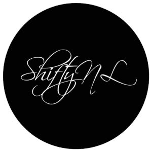 A stunning black circular logo with elegant white cursive text reading "ShiftyNL" for a professional photography website.