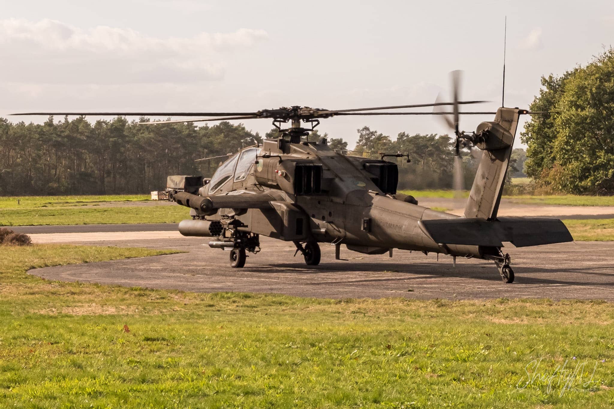 Royal Netherlands Air Force AH-64D Apache on the ground at Deelen Air Base with its rotors turning, during exercise Falcon Autumn, the Netherlands, October 2018.