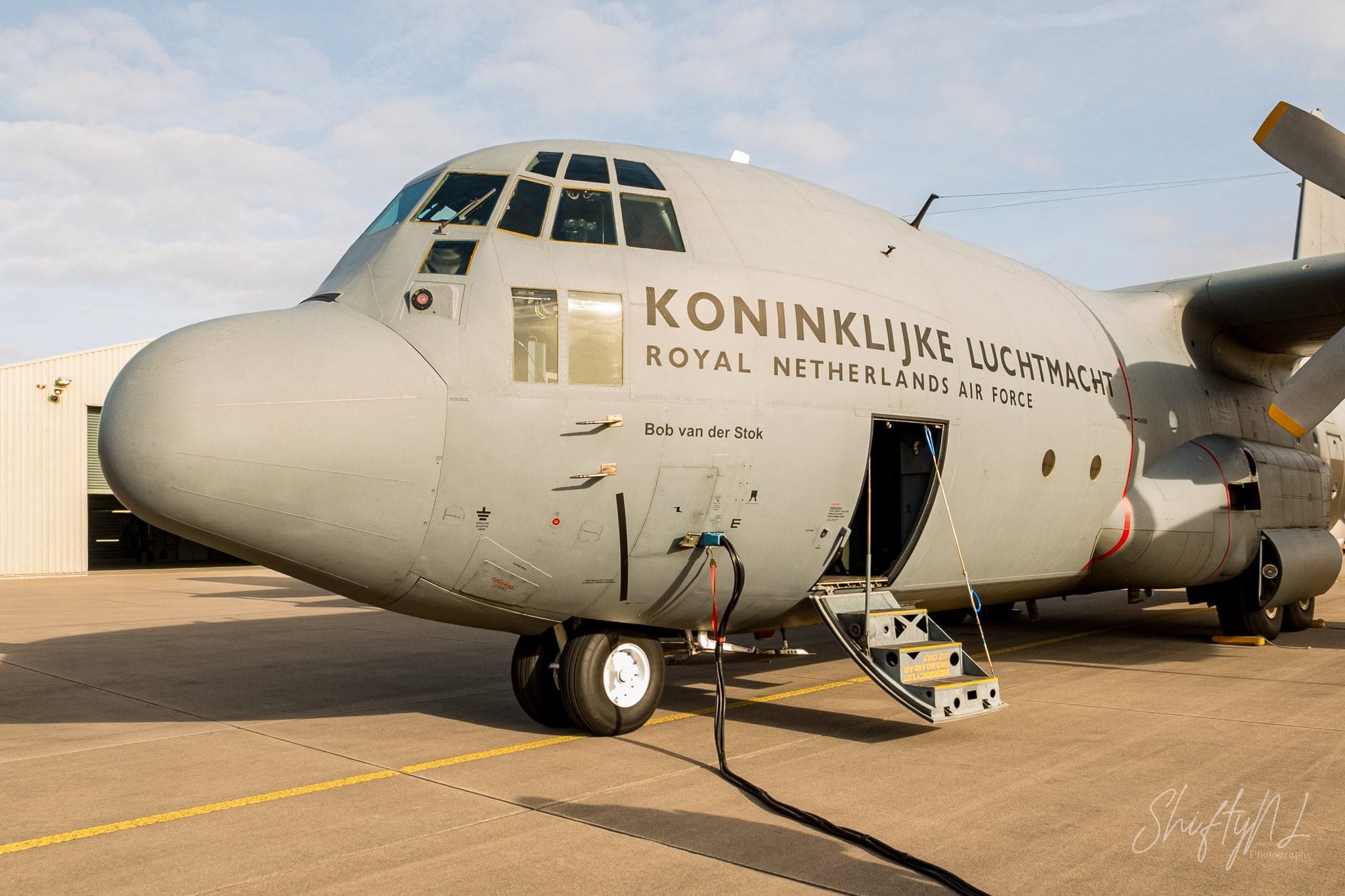 Royal Netherlands Air Force C-130H Hercules named Bob van der Stok on the platform with its crew door open, October 2018.