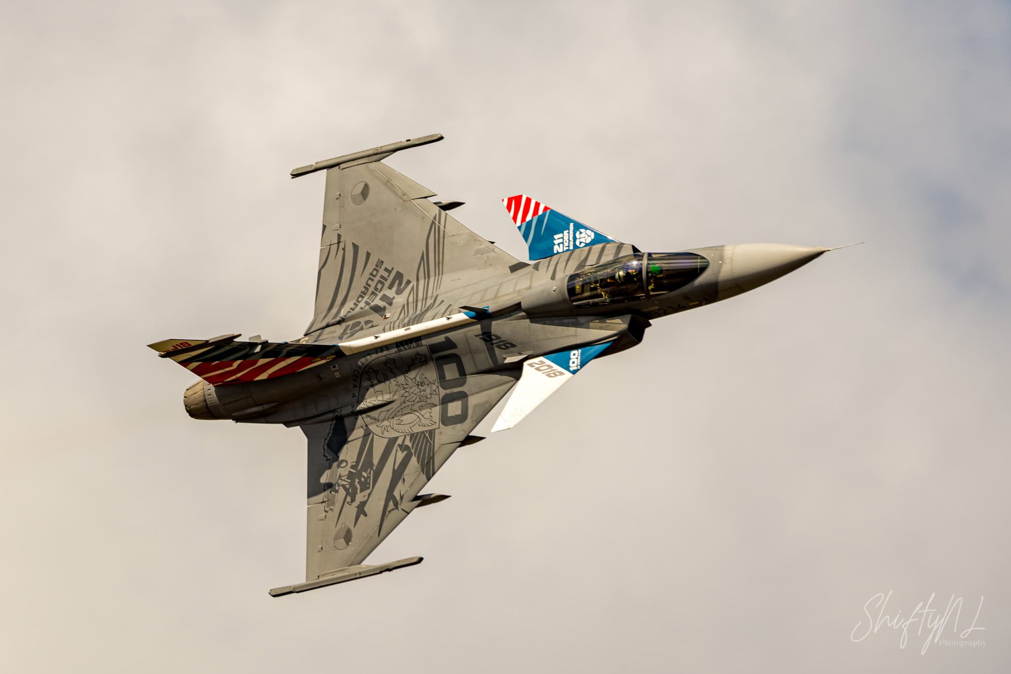 Czech Gripen 9241 Czech Air Force Saab JAS 39C Gripen 9241 in its striking NATO Tiger Meet 2018 tiger livery, banking overhead at the Belgian Air Force Days, Kleine-Brogel Air Base, Belgium, September 2018.