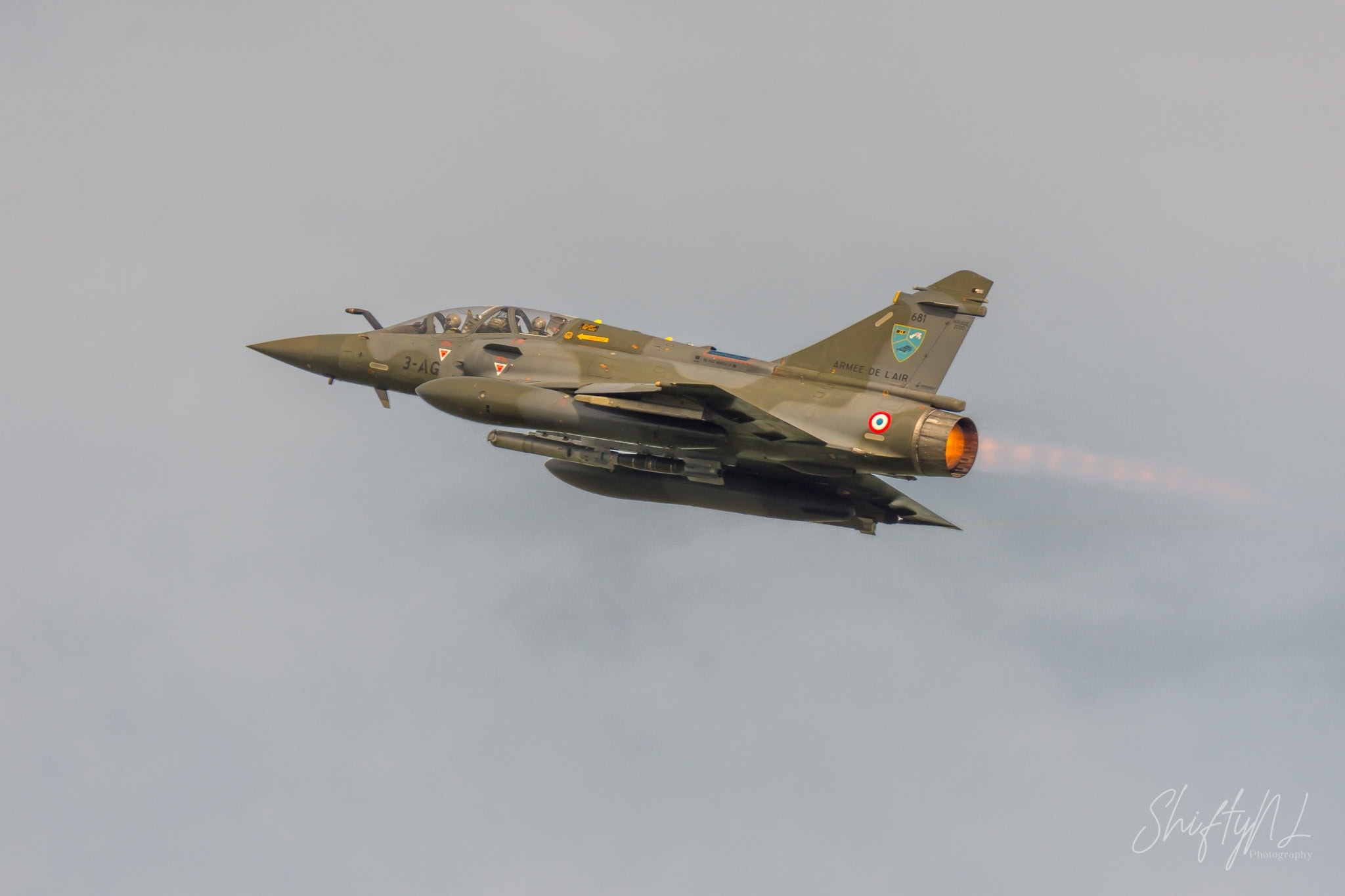 French Air Force Mirage 2000D taking off with afterburner during the Frisian Flag 2018 exercise at Leeuwarden Air Base, the Netherlands, April 2018.