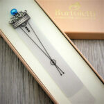 Vista general del marca-páginas en bronce y cristal de Murano