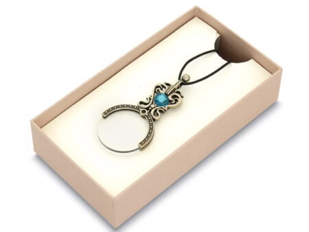 Lupa colgante en bronce con la perla de cristal de Murano en turquesa