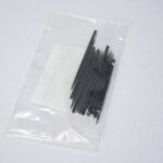 vista de la bolsita de 12 agujas de recambio para punzón