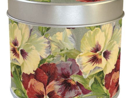 Vela perfumada en lata con aroma a rosa y diseño de flores de violeta
