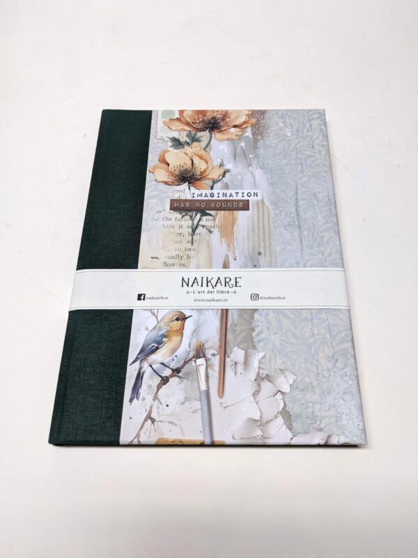 Vista de la portada del Diario con tela verde y estampado de pájaro