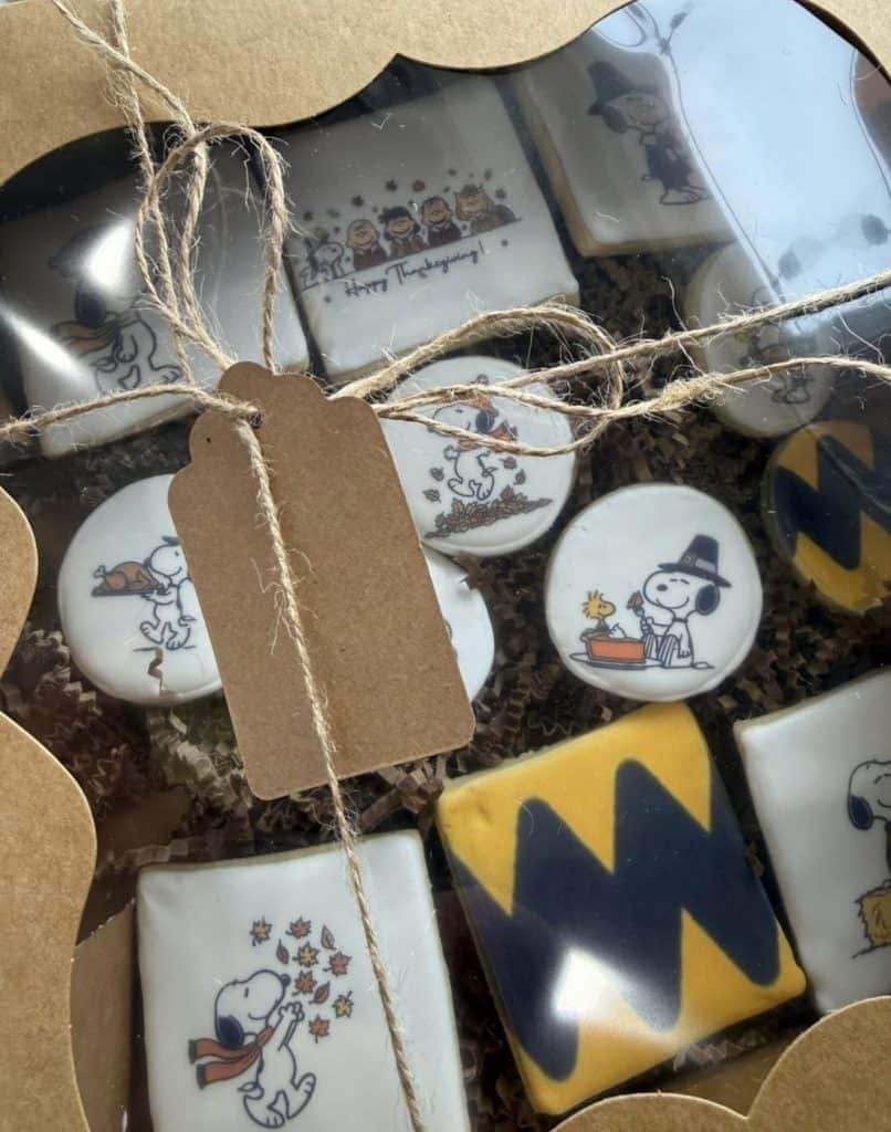 Decorative cookies from Smutz Girls Bakery with Snoopy and holiday themes.